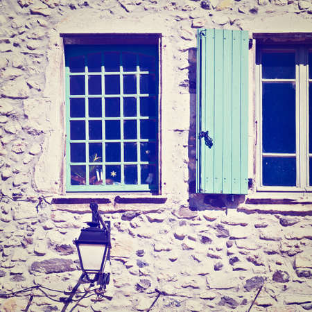 Windows on the Facade of French Stone House, Retro Effectの写真素材