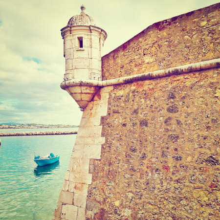 Boat in a Quiet Harbor on the Atlantic Coast of Portugalのeditorial素材