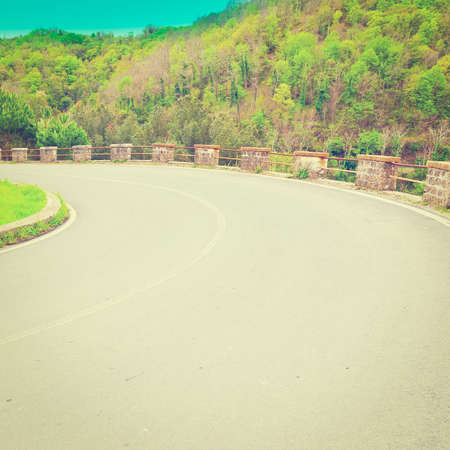 Winding Paved Road in the Tuscany, Italyの写真素材