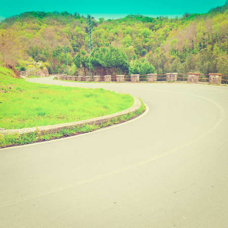 Winding Paved Road in the Tuscany, Italyの写真素材