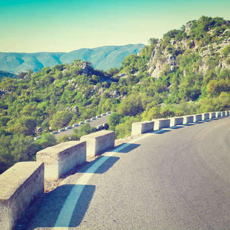 winding asphalt road in the cantabrian mountains, spainの写真素材