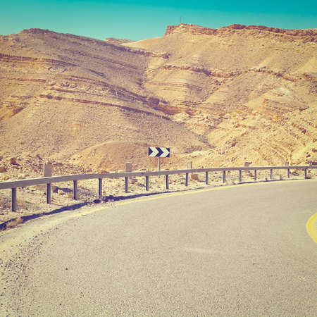 Asphalt Road in the Negev Desert in Israel.の写真素材