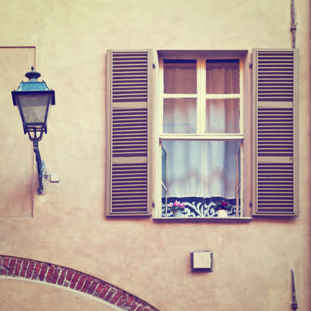 Window on the Facade of the Restored Italian Home.の写真素材