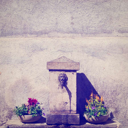 Old Drinking Fountain in Italyの写真素材
