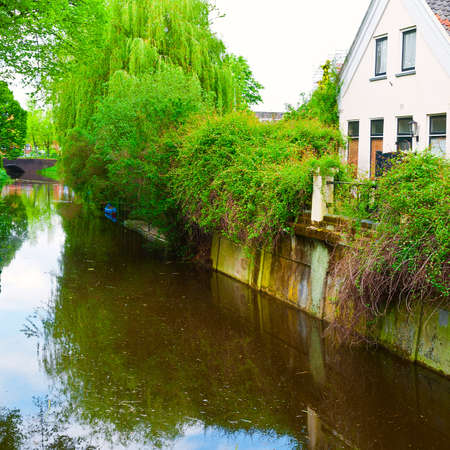 Canal and Embankment of the City Zutphenin Hollandの写真素材