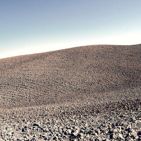 Plowed Sloping Hills of Tuscany in the Autumn, Vintage Style Toned Pictureの写真素材