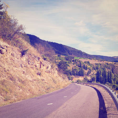 winding paved road in the french alps,の写真素材