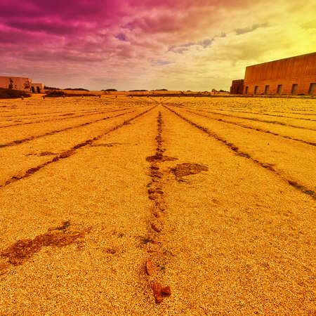 Giant Sundial in Portuguese Fortress Sagres on the Deserted Beach of the Atlantic Ocean at Sunsetの写真素材