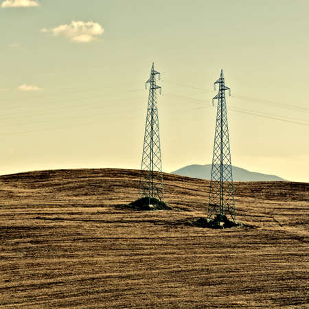 Plowed Sloping Hills of Tuscany in the Autumn, Vintage Style Toned Pictureの写真素材