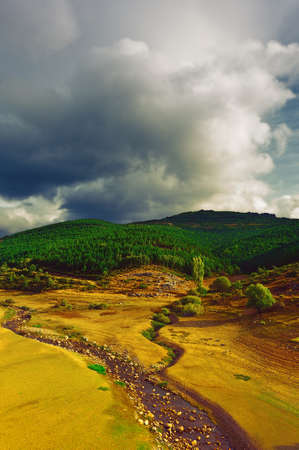 River on the Bottom of Canyon in the Cantabrian Mountainsの写真素材