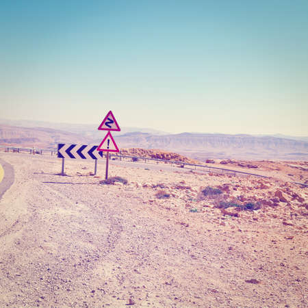 winding asphalt road in the negev desert in israel,  effectの写真素材