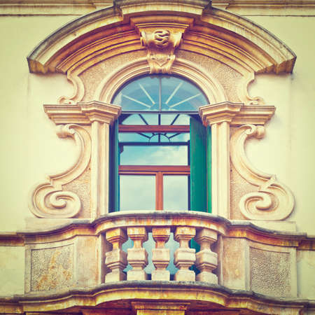 The Renovated Facade of the Old Italian House with Balconyの写真素材