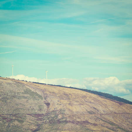 modern wind turbines producing energy in portugalの写真素材