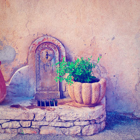 old drinking fountain in franceの写真素材