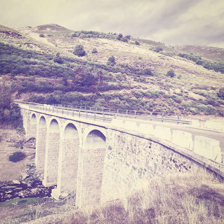 Bridge on the Bottom of Canyon in the Cantabrian Mountains, Vintage Style Toned Pictureの写真素材