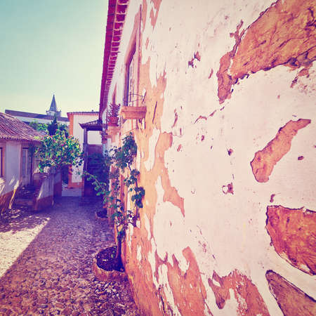 Narrow Street in the Medieval Portuguese City of Obidosの写真素材