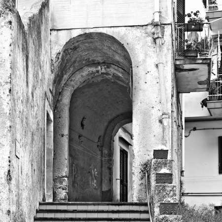 Narrow Alley with Stairs in Italian City of Cetara, Retro Image Filtered Styleの写真素材
