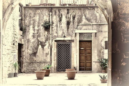 Courtyard in the Sicilian City of Piazza Armerina, Retro Image Filtered Styleの写真素材