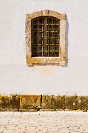 Window in the Wall of Portuguese Homeの写真素材