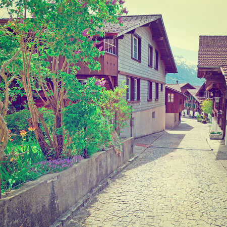 Street with Old Wooden Buildings in Swiss Village, の写真素材