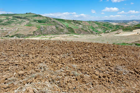 Plowed Sloping Hills of Sicily in the Springの写真素材
