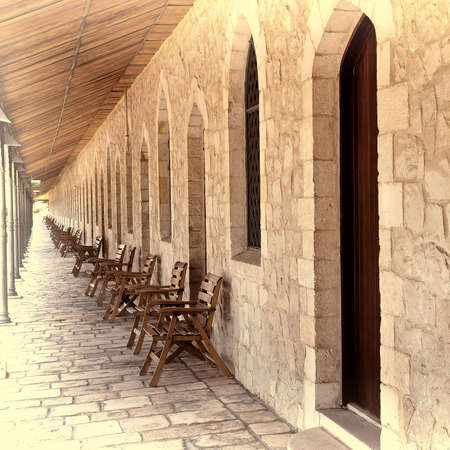 Covered Wooden Gallery in Jerusalem, Israel, Vintage Style Toned Pictureの写真素材