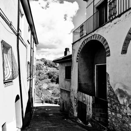 Narrow Street with Old Buildings in Italian City, Retro Image Filtered Styleの写真素材