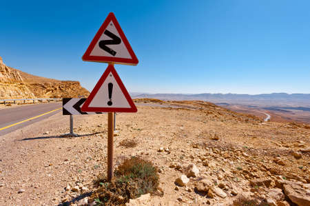 Winding Asphalt Road in the Negev Desert in Israelの写真素材