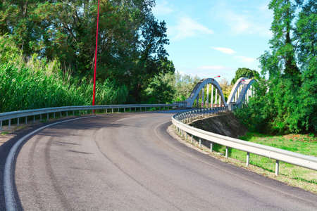 Winding Asphalt Road in Franceの写真素材