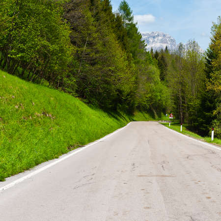 Winding Asphalt Road in the Italian Alpsの写真素材