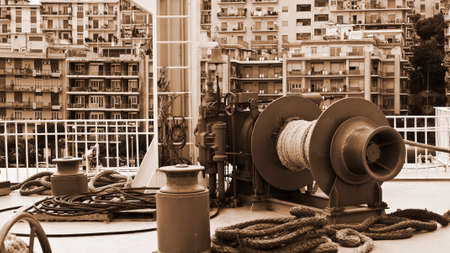 Bow of the Ferry on the Background of the City of Messina, Vintage Style Sepiaのeditorial素材