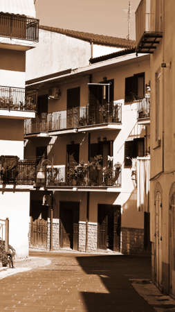Italian Balconies Decorated with Fresh Flowers, Vintage Style Sepiaのeditorial素材