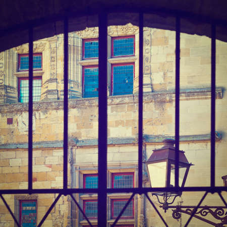 French House through the Lattice of Gateの写真素材