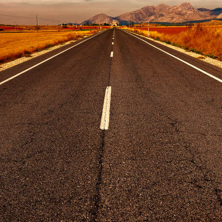 Asphalt Road in the Cantabrian Mountain at Sunset, Vintage Style Toned Picture