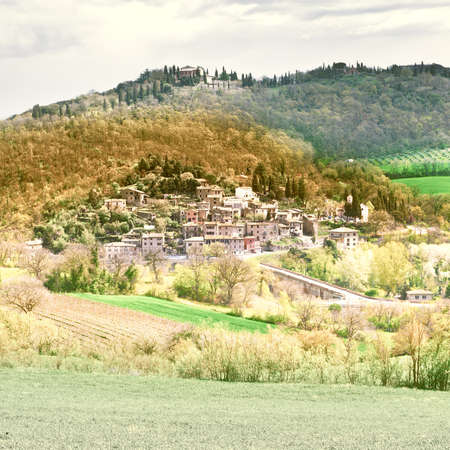 View of the Medieval City in Tuscany, Vintage Style Toned Pictureの写真素材