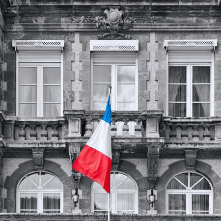 French Flag at Facade of Historic Building in the City of Mende, Retro Image Filtered Styleの写真素材
