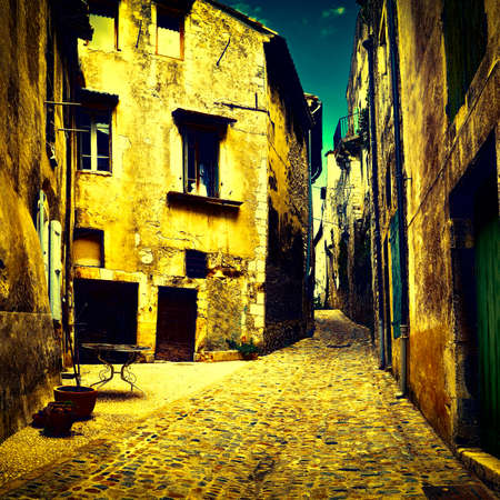 Old Street in the French City of Viviers at Night, Vintage Style Toned Pictureの写真素材