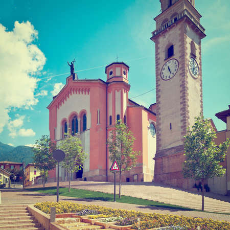 Church with Belfry in the Italian City of Levico Termeの写真素材