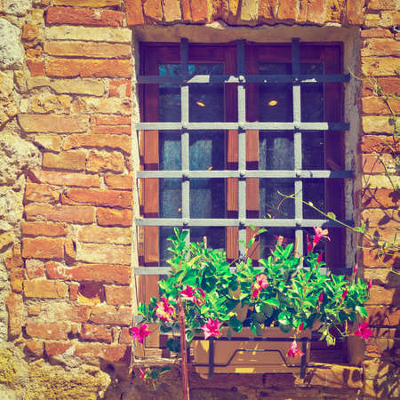 Italian Window  Decorated with Fresh Flowers,の写真素材