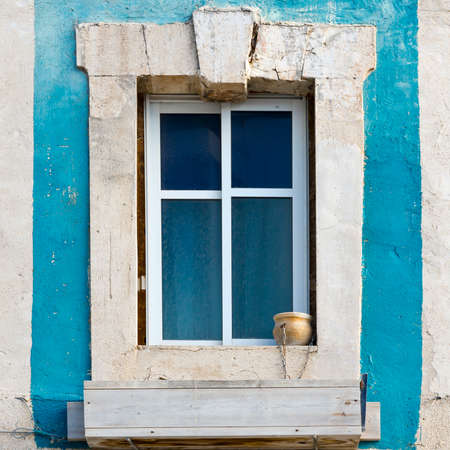 Israel Old Window Decorated with Ceramic Flower Pot in Jaffaの写真素材