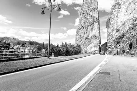 Embankment of the River Meuse in the Belgian City of Dinant. The Meuse River passing through the town of Dinant, located in the Walloon. Black and White Pictureの写真素材