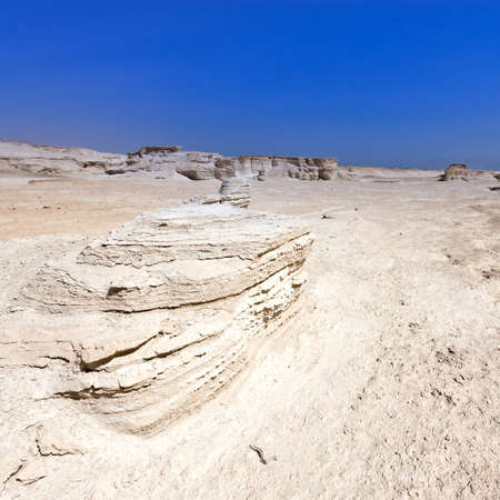 Rocky hills of the Negev Desert in Israel. Breathtaking landscape of the desert rock formations in...