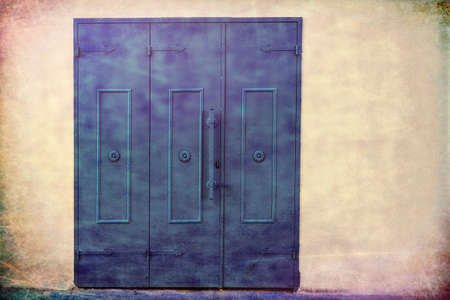 Metal gate in the old city of Akko in Israel.  Traditional Arabic style for gates in old Acre. Vintage style toned pictureの写真素材