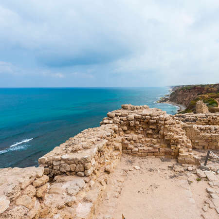Ruins of the crusader fortress of the city Arsour in Israel. Dunes on the shore of the Mediterranean...