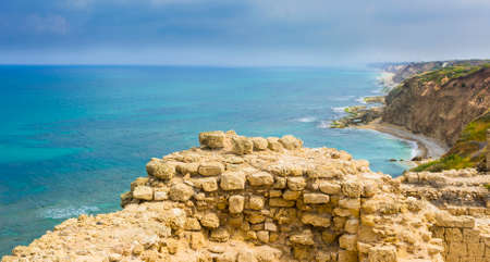 Ruins of the crusader fortress of the city Arsour in Israel. Dunes on the shore of the Mediterranean sea. の写真素材