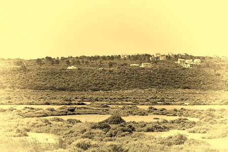 Swamp on the Shore of Atlantic Ocean in Portugal near the Village, Stylized Photoの写真素材