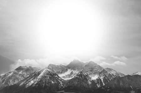 Morning mist in Italian Alps at sunrise. Black and white pictureの写真素材