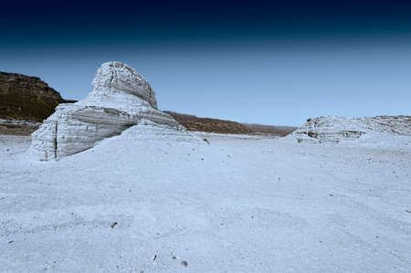 Rocky hills of the Negev Desert in Israel at night. Wind carved rock formations in the Southern Israel Desertの写真素材
