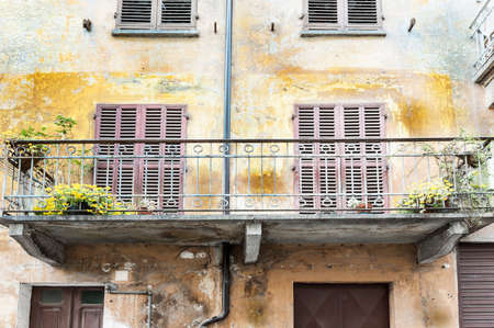 Architecture of the Medieval Piedmont City of Cuneo in Italy. Vintage Italian balcony in Mediterranean styleの写真素材