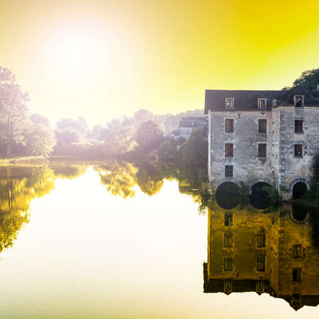 Morning Mist in the French City of Terrasson. Cityscape in France at sunrise
